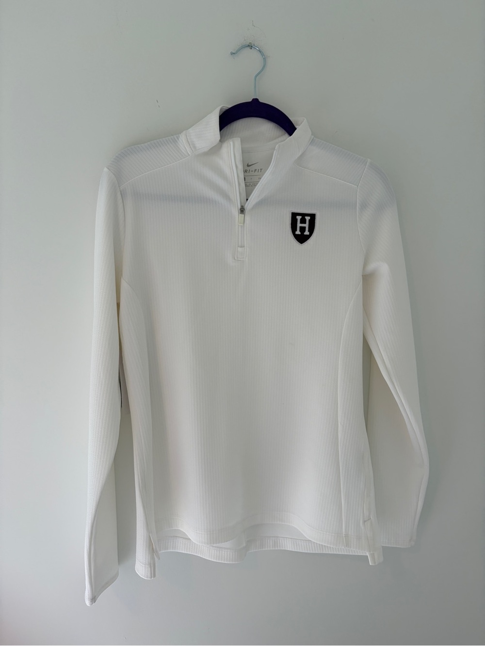 Nike White Dri-FIT Quarter‑Zip Pullover with Black Shield Patch